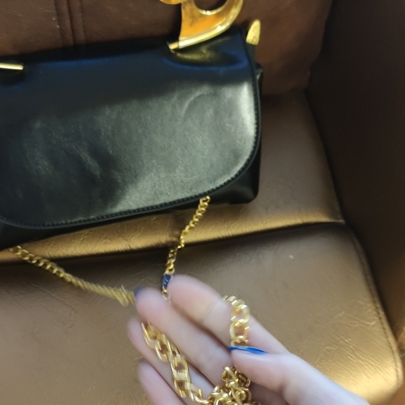 Elegant Black Clutch with Gold Accent - Picture 3 of 4